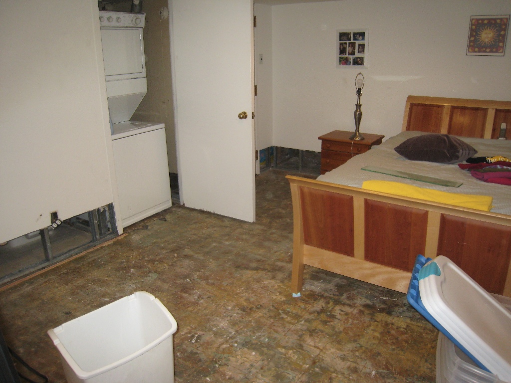 Our bedroom, sans carpet and lower wall - 2