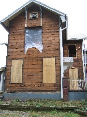 Library & TV room, sans siding