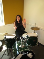 Sarah at the drums
