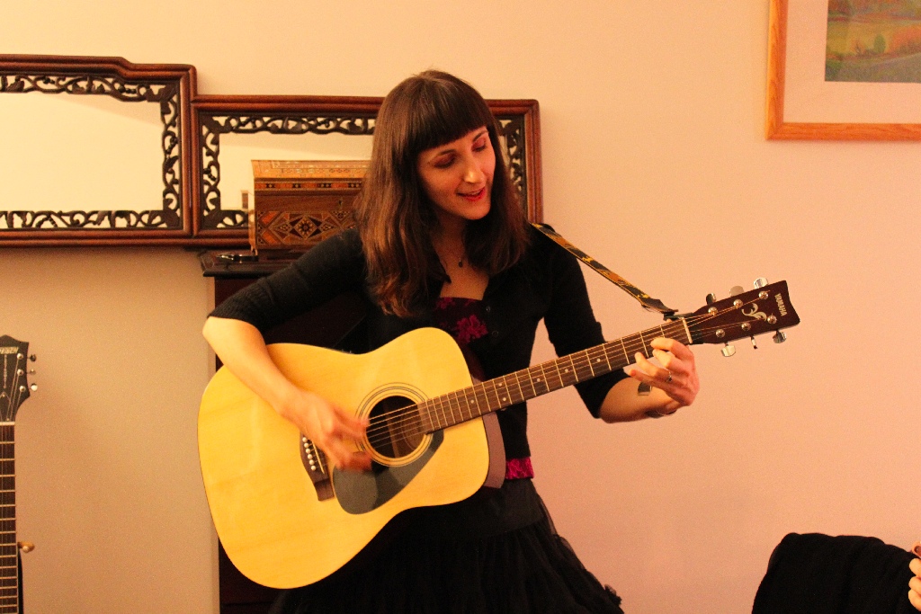 Cathy on guitar