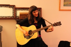 Cathy on guitar