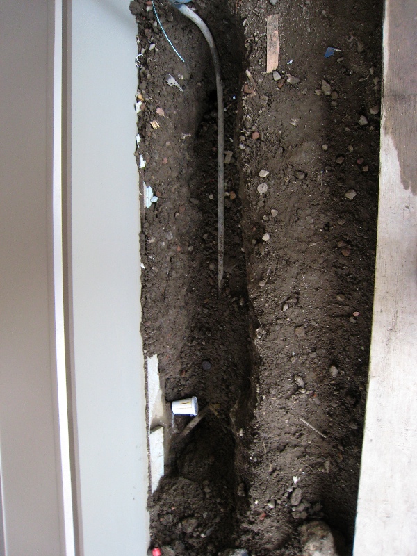 Trench by the outhose -- latrine?